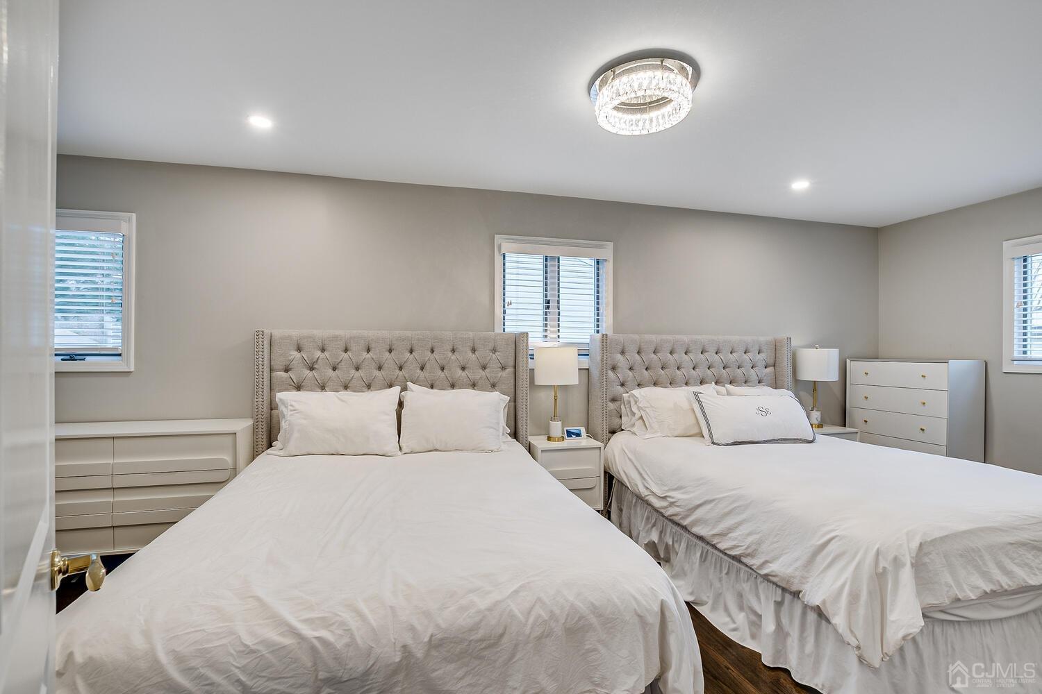 12 Eardley Road Edison, NJ 08817 - Photo 18 of 36 a bedroom with two beds and a window