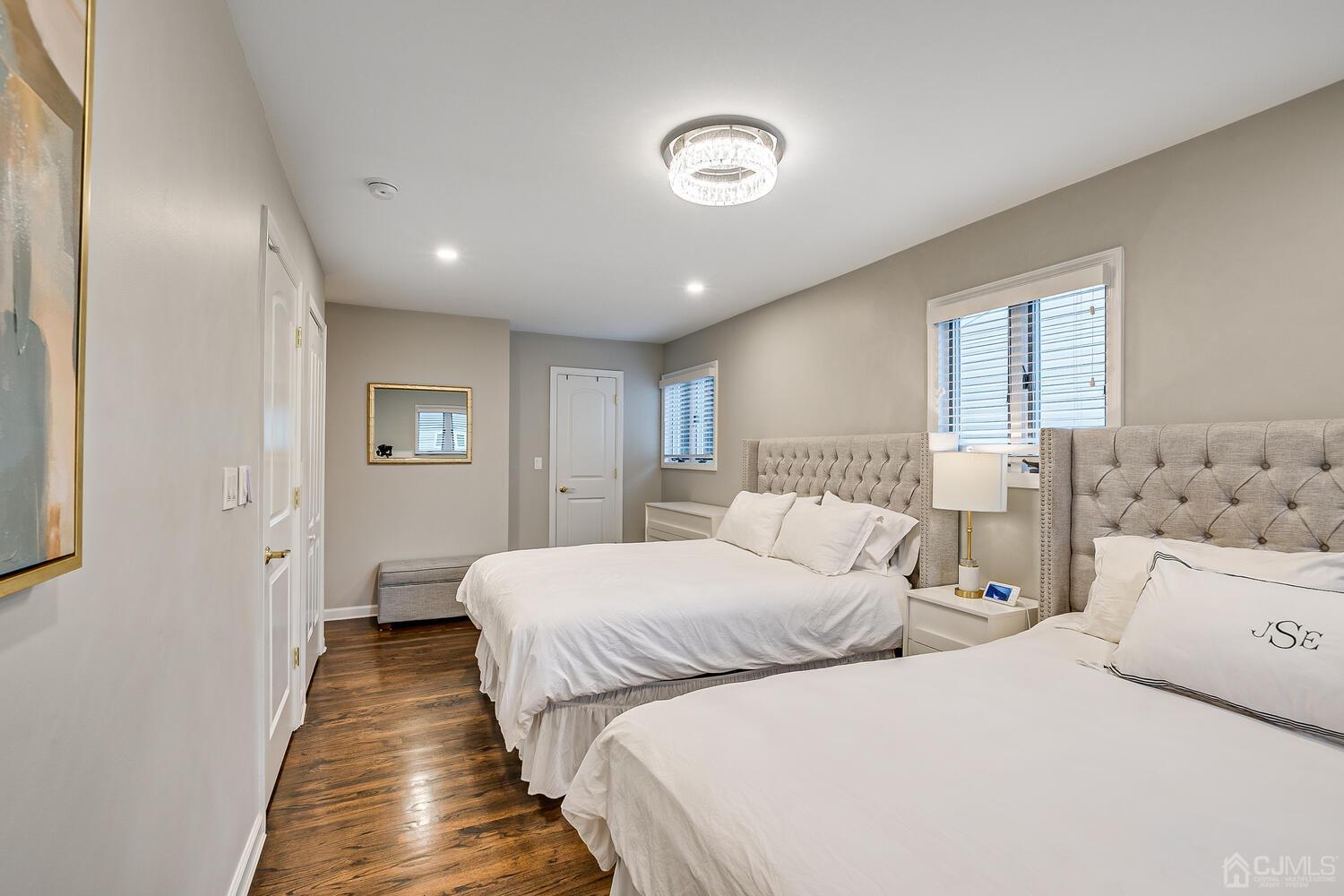 12 Eardley Road Edison, NJ 08817 - Photo 20 of 36 a bedroom with double bed and a window