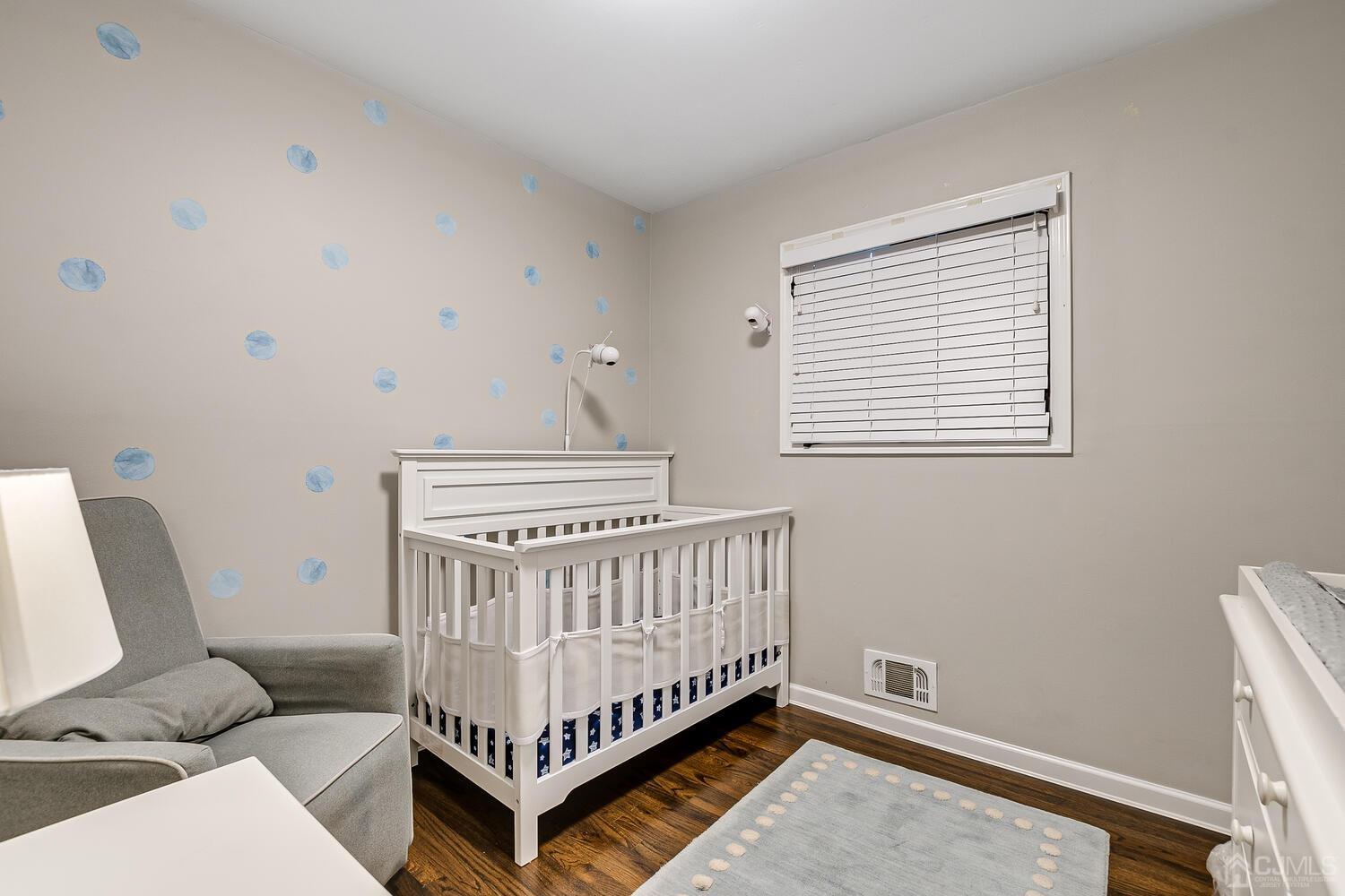 12 Eardley Road Edison, NJ 08817 - Photo 23 of 36 a bedroom with furniture and a window