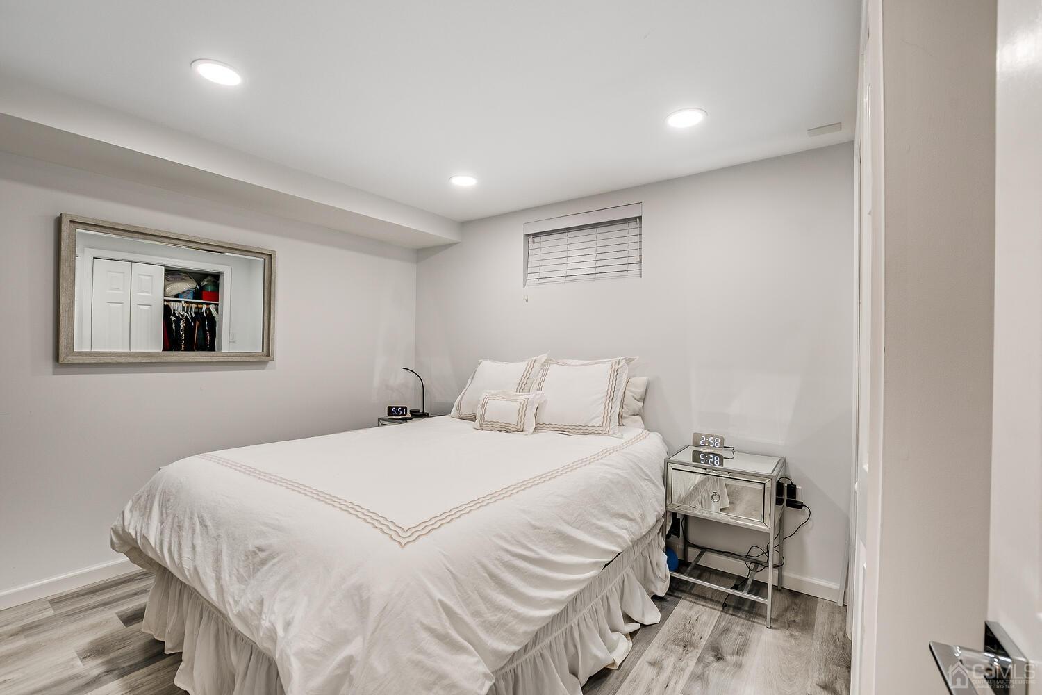 12 Eardley Road Edison, NJ 08817 - Photo 30 of 36 a bedroom with a bed and a desk