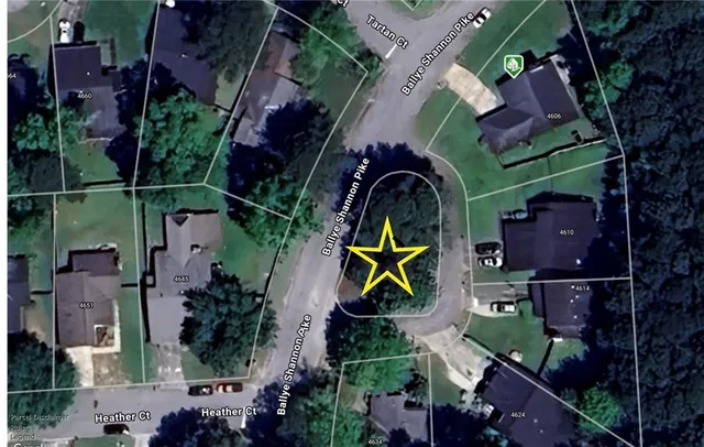 an aerial view of houses and roads