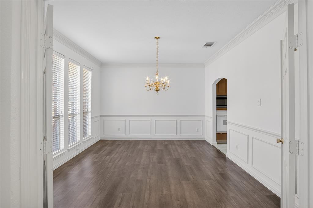 3716 Lowrey Way Plano, TX 75025 - Photo 4 of 28 wooden floor in an empty room with a window