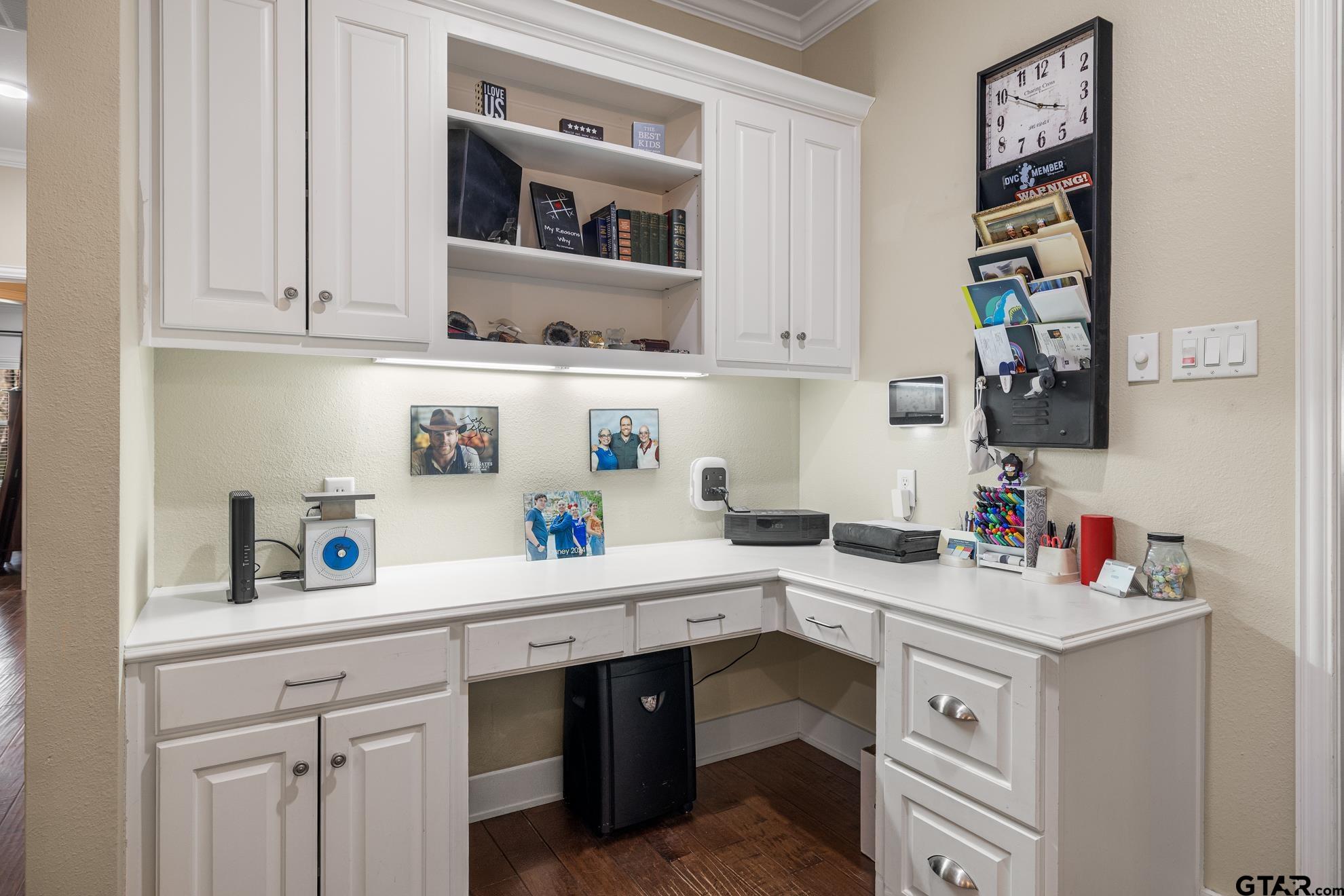 9453 Cherokee Trail Tyler, TX 75703 - Photo 16 of 40 a kitchen with a sink cabinets and window