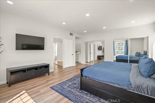 a bathroom with a double vanity sink and mirror