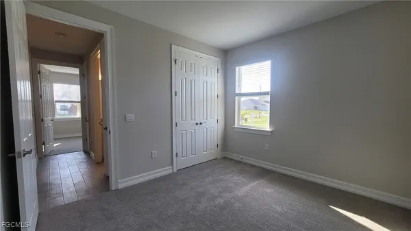 wooden floor and windows in an empty room