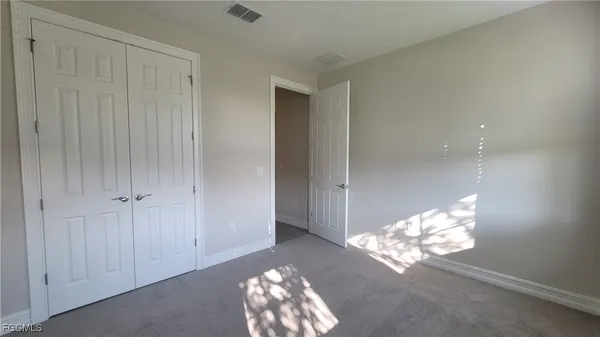 a view of a chandelier in a room