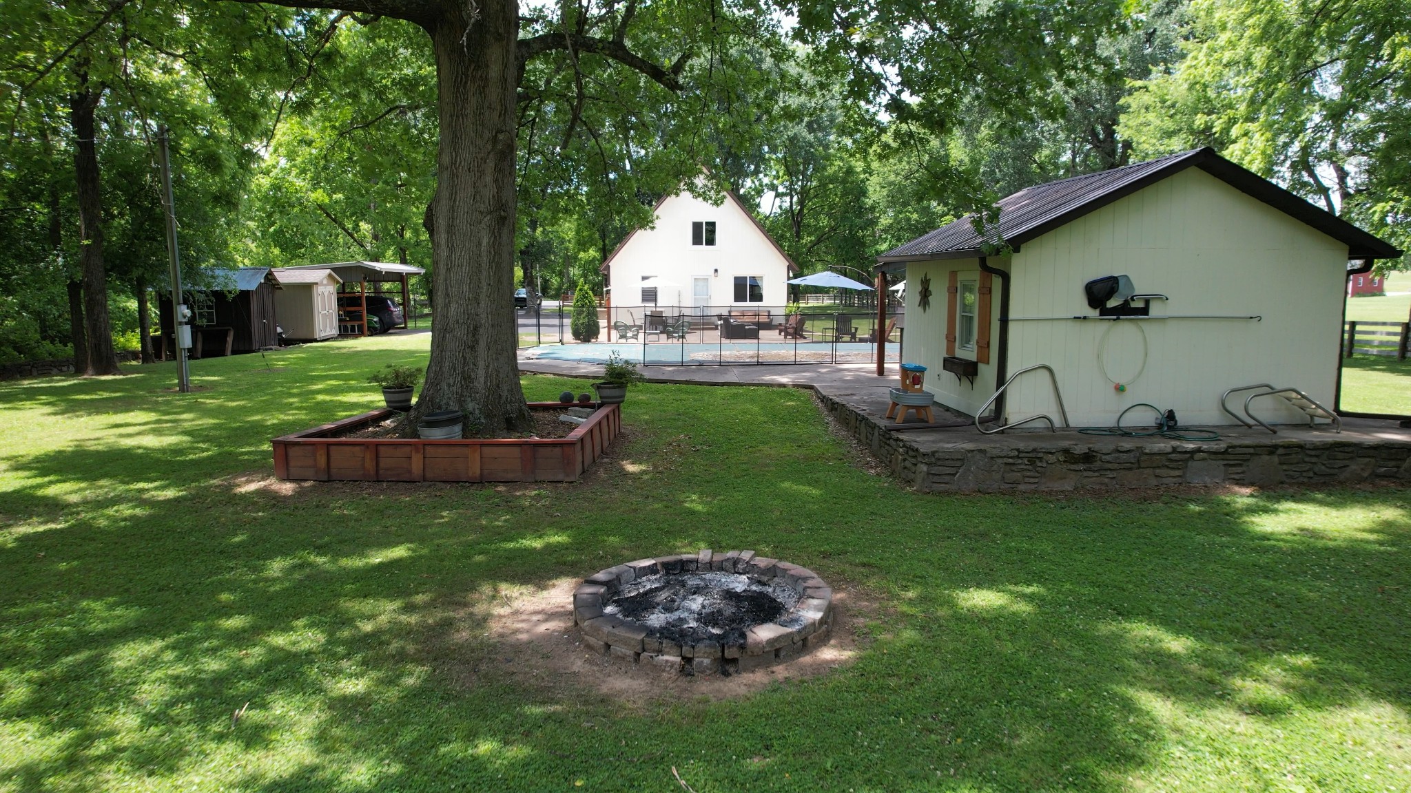 2540 Carl Fox Road Cornersville, TN 37047 - Photo 43 of 48 a house view with a garden space
