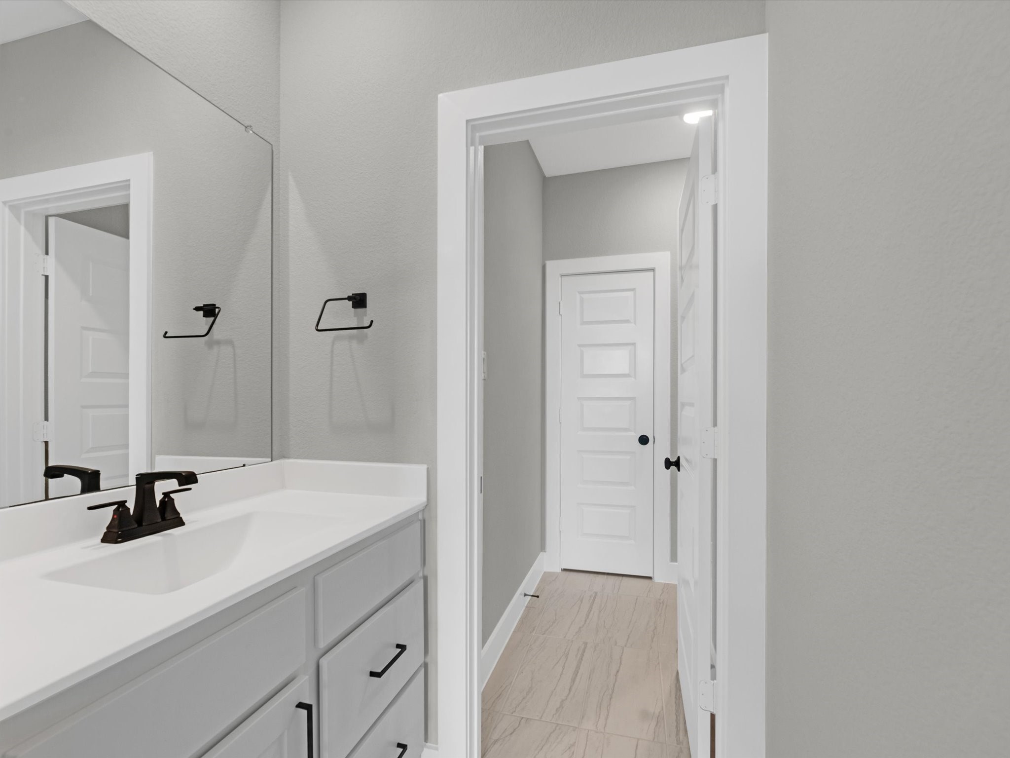 8123 Sunny Rdg Drive Fulshear, TX 77441 - Photo 21 of 42 a bathroom with a sink and a mirror