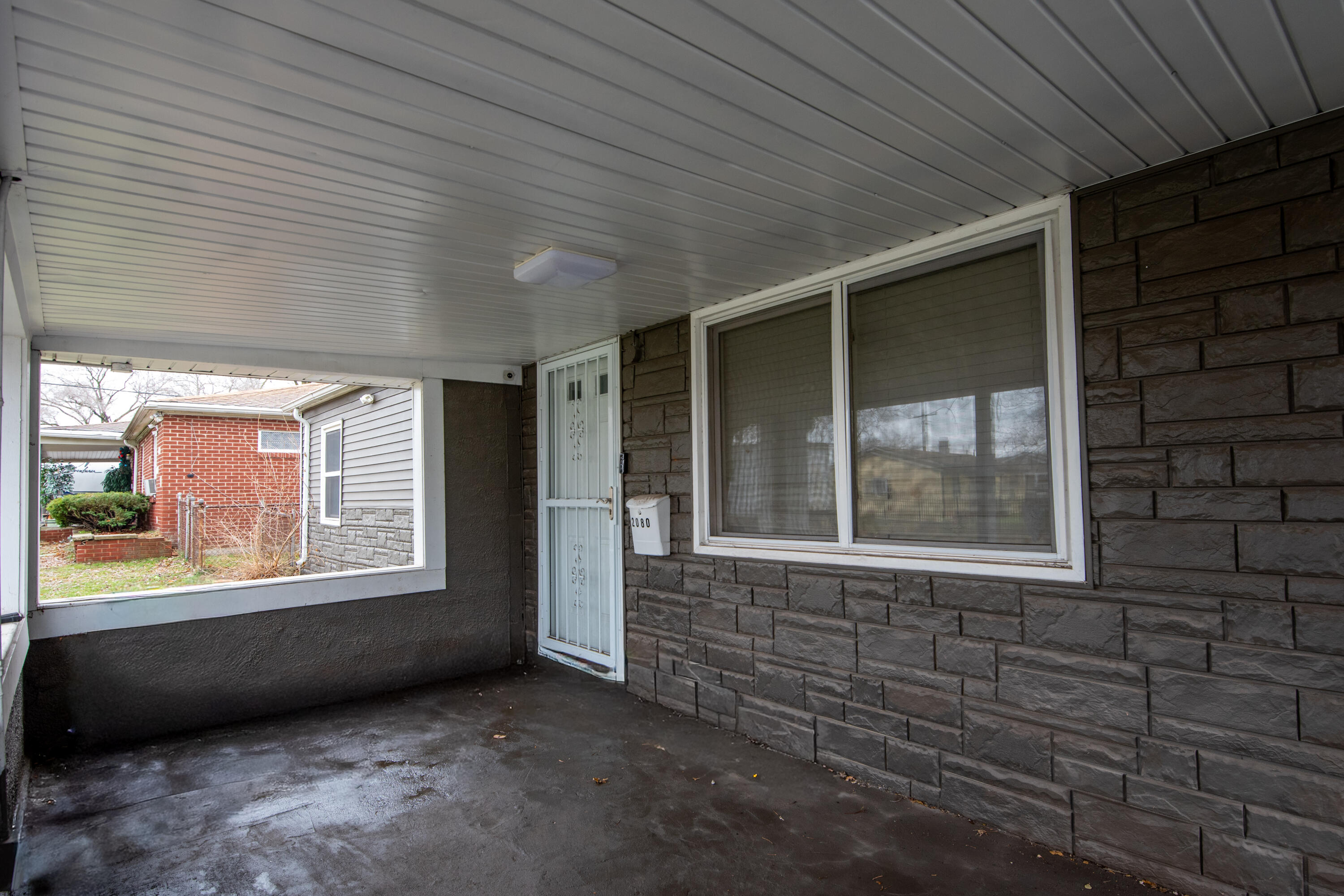 2080 Wright Street Gary, IN 46404 - Photo 3 of 20 a view of an empty room with a window