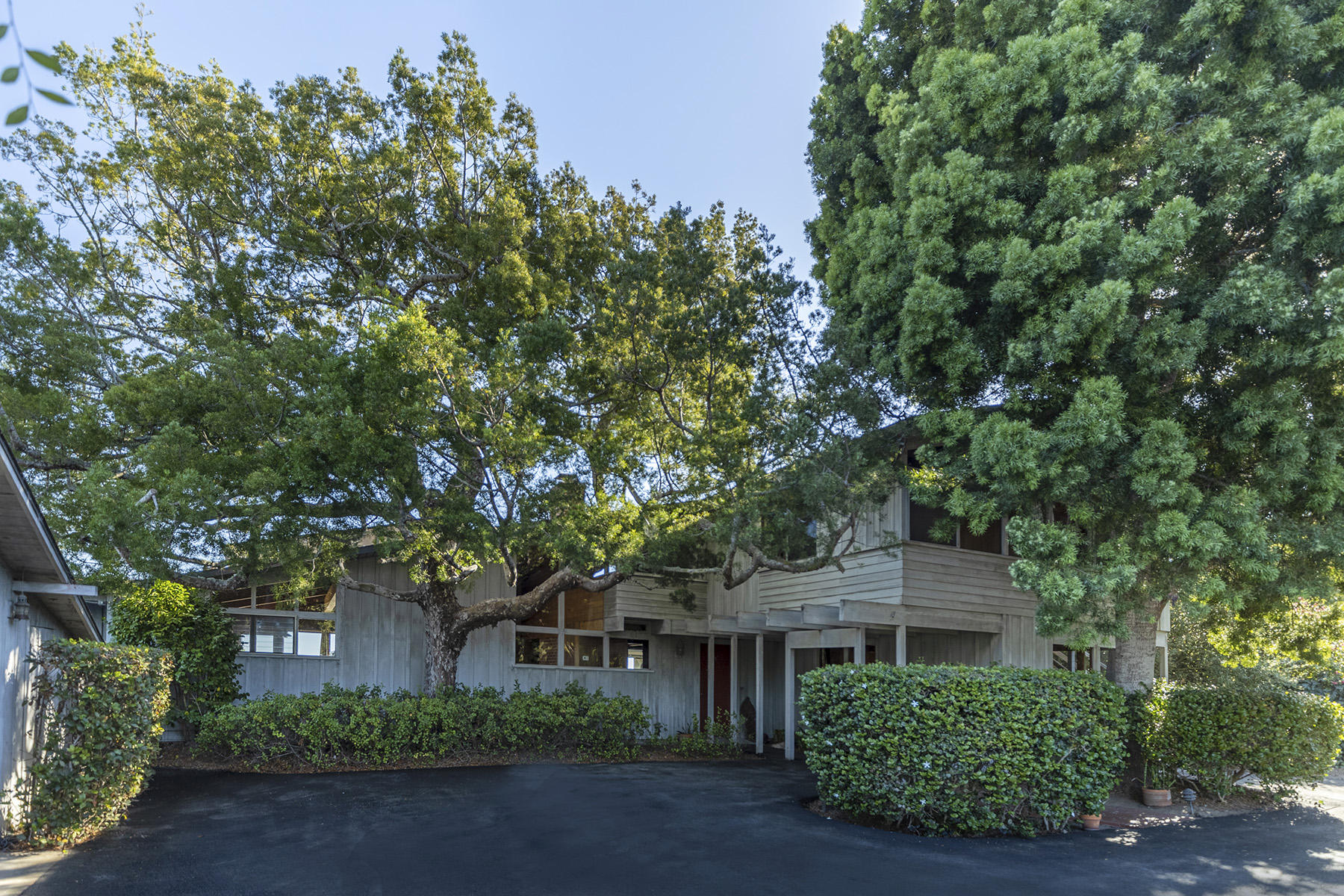 3239 Cliff Drive Santa Barbara, CA 93109 - Photo 6 of 8 front view of a house with a tree