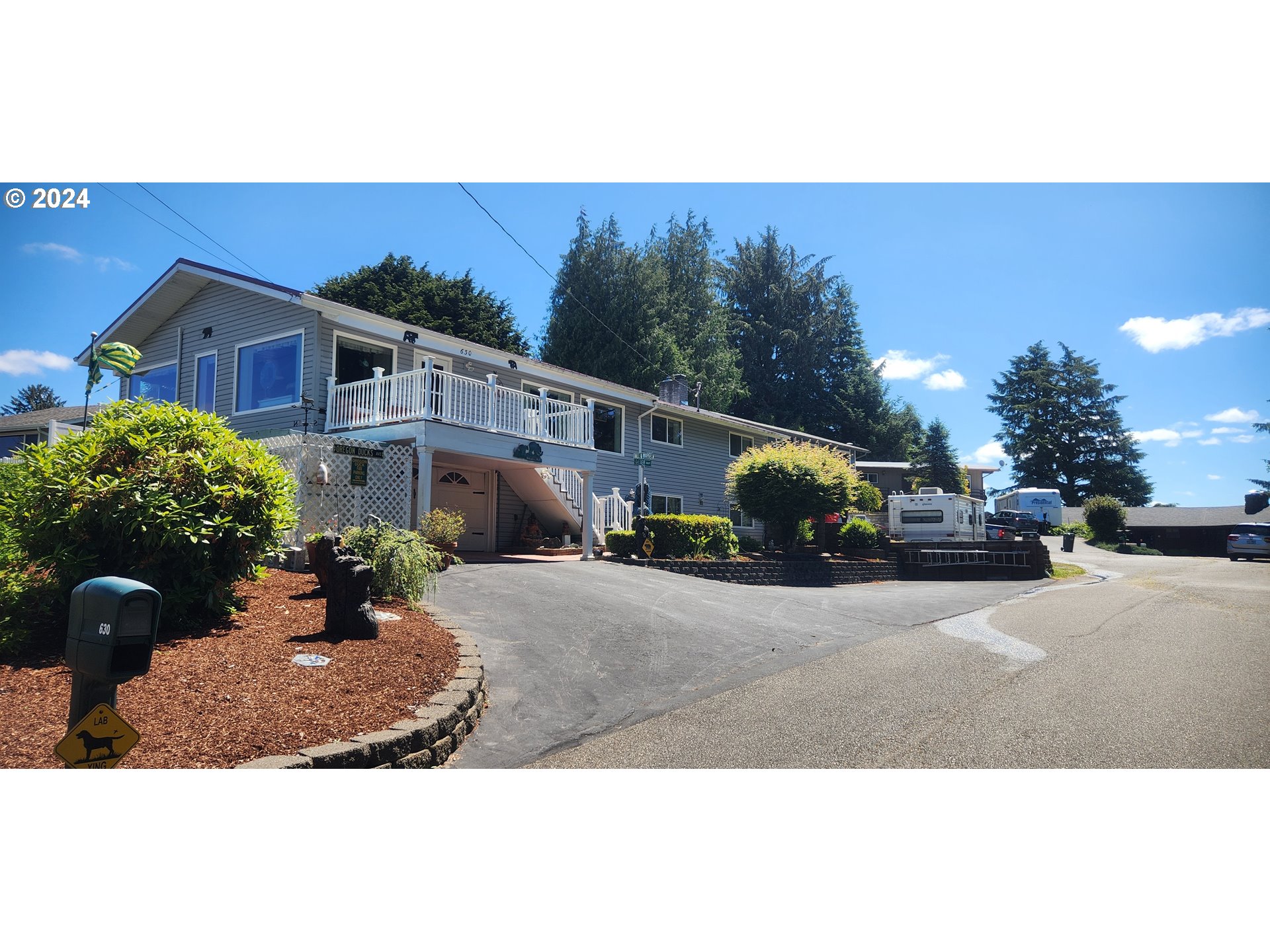 630 Crestview Drive Reedsport, OR 97467 - Photo 1 of 44 a view of a house with a street