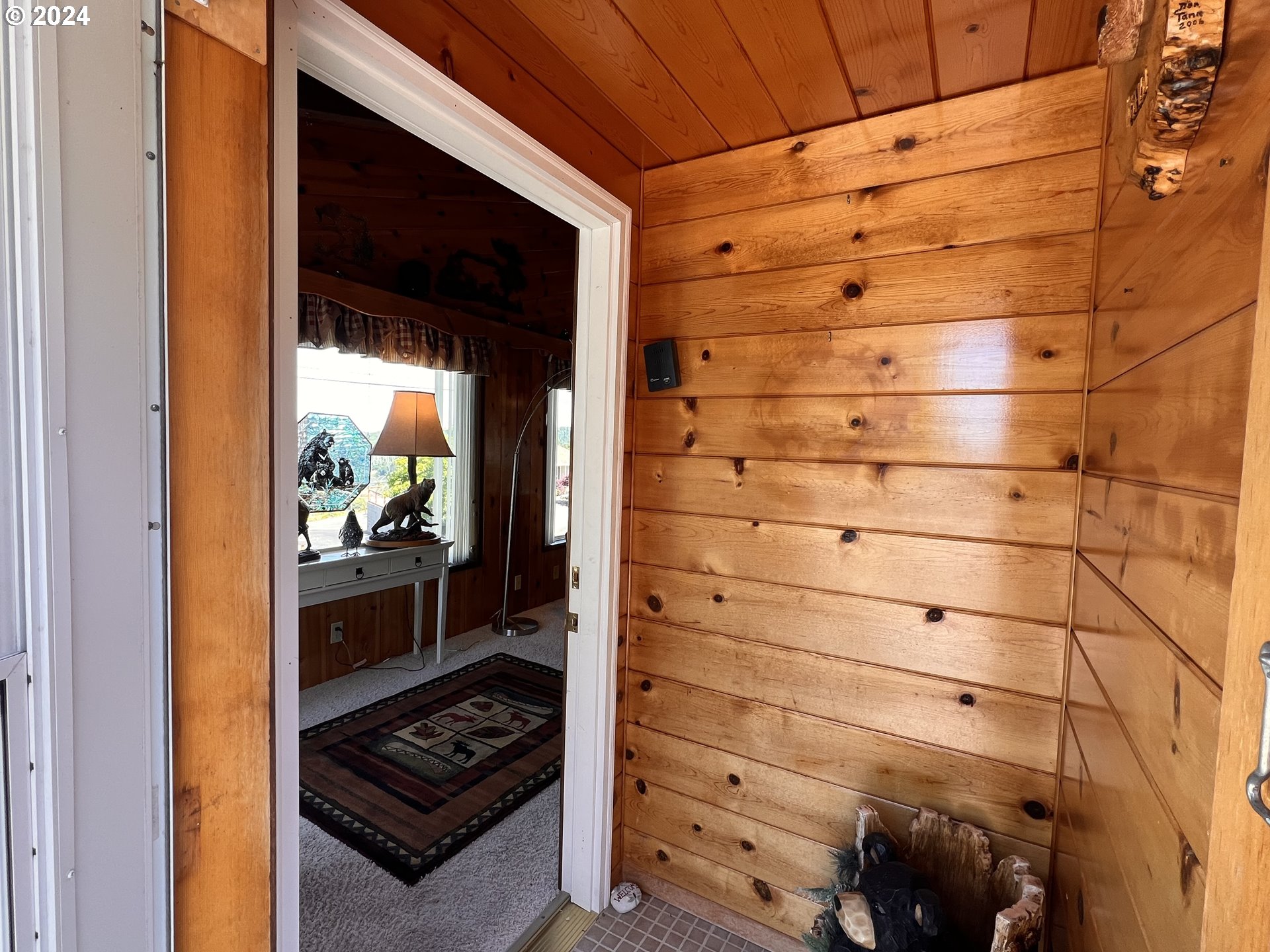 630 Crestview Drive Reedsport, OR 97467 - Photo 14 of 44 a kitchen with a stove and a refrigerator