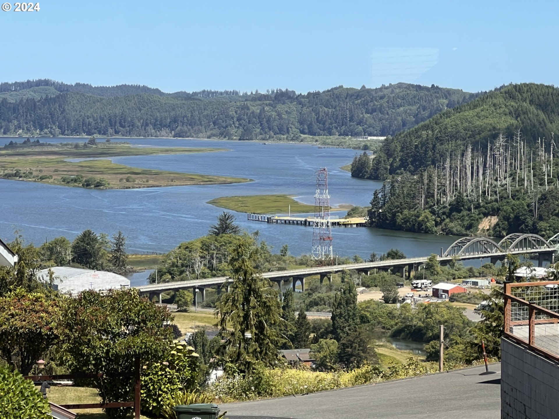 630 Crestview Drive Reedsport, OR 97467 - Photo 6 of 44 a view of a city and lake