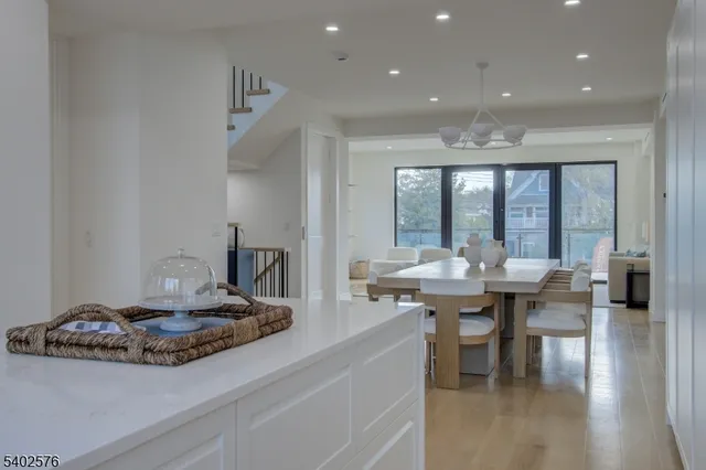 a view of a patio with couches and a potted plant