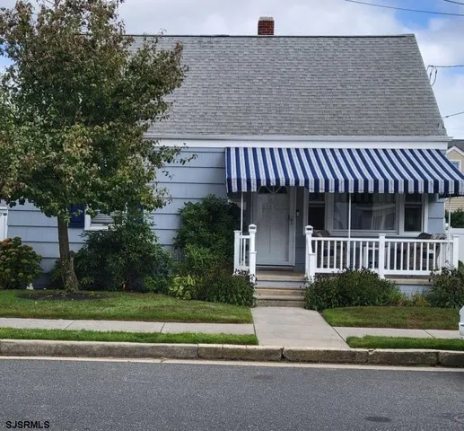 a front view of a house having yard
