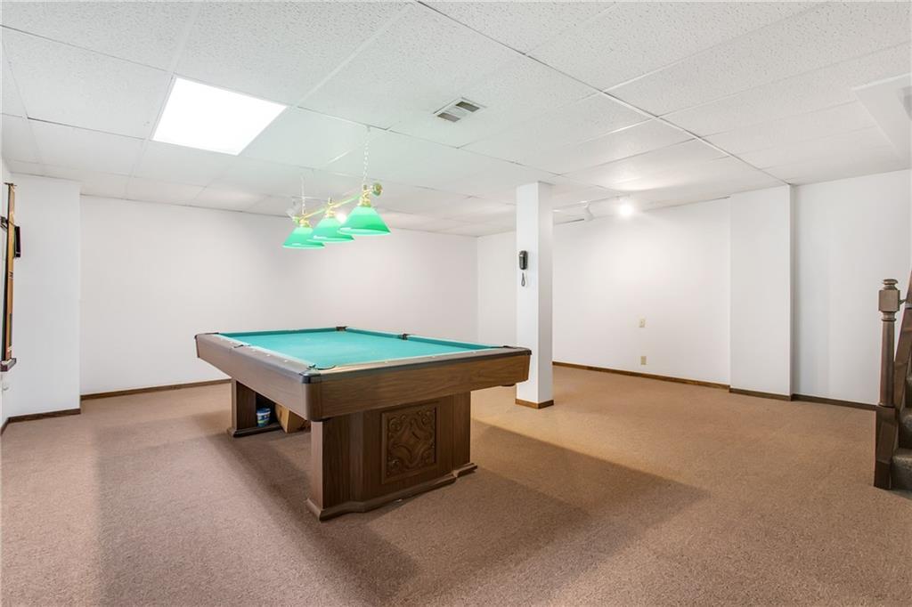 104 Forest Hills Road Pittsburgh, PA 15221 - Photo 22 of 25 The lower level billiard room. This is 1/2 of the enormous game room. the space all benefits from a full bath.