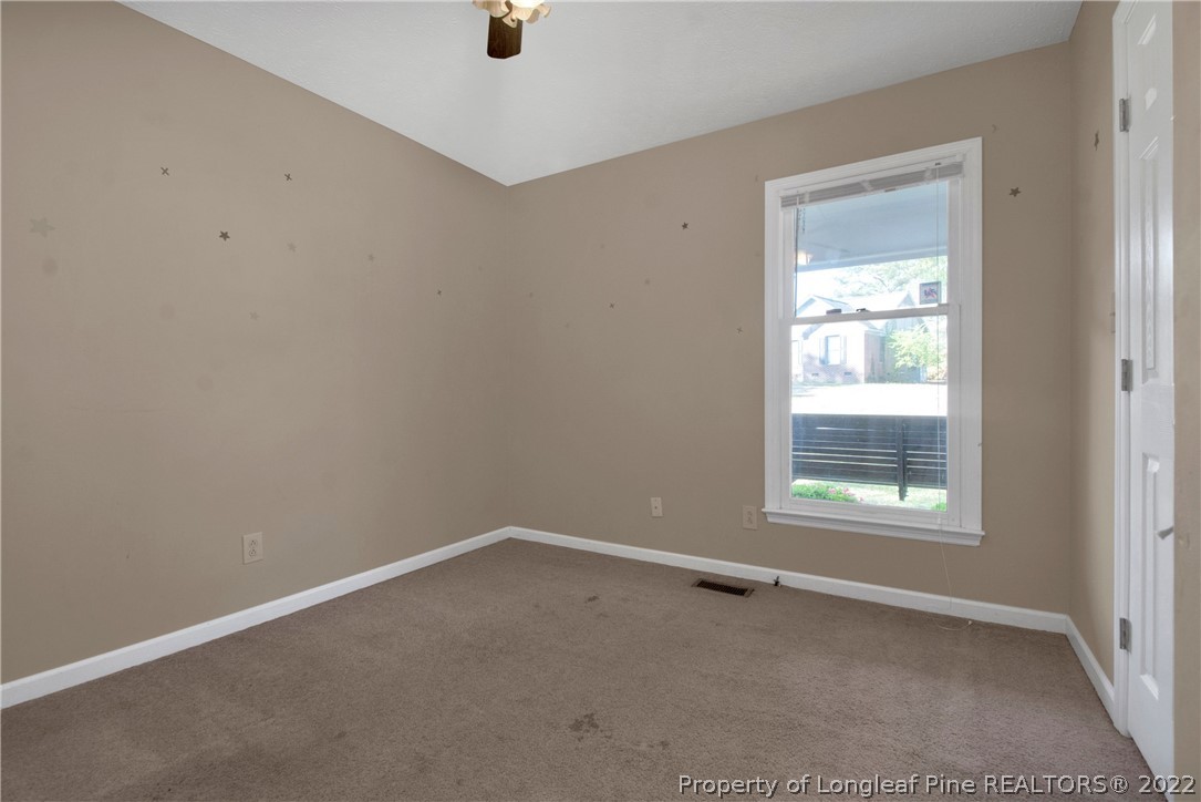 5090 Summer Ridge Road Fayetteville, NC 28303 - Photo 23 of 30 an empty room with a window
