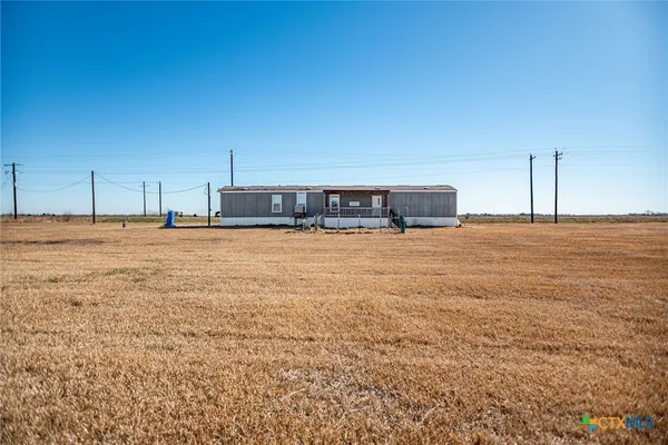 a view of a room with an ocean