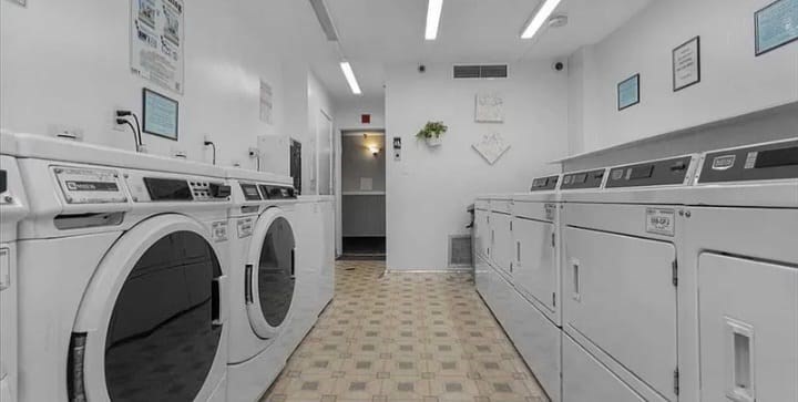 70 Southbridge Street, Unit 504 Worcester, MA 01608 - Photo 14 of 15 a utility room with dryer and washer