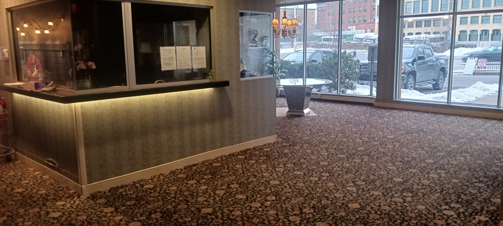 70 Southbridge Street, Unit 504 Worcester, MA 01608 - Photo 2 of 15 a living room with furniture
