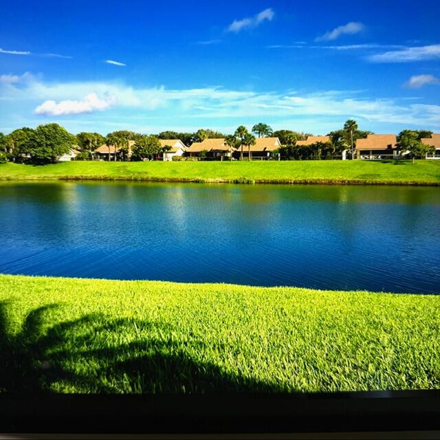 150 Beach Summit Court Jupiter, FL 33477 - Photo 2 of 31 Lake behind house