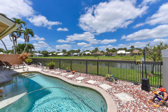 150 Beach Summit Court Jupiter, FL 33477 - Photo 21 of 31 Pool overlooks lake