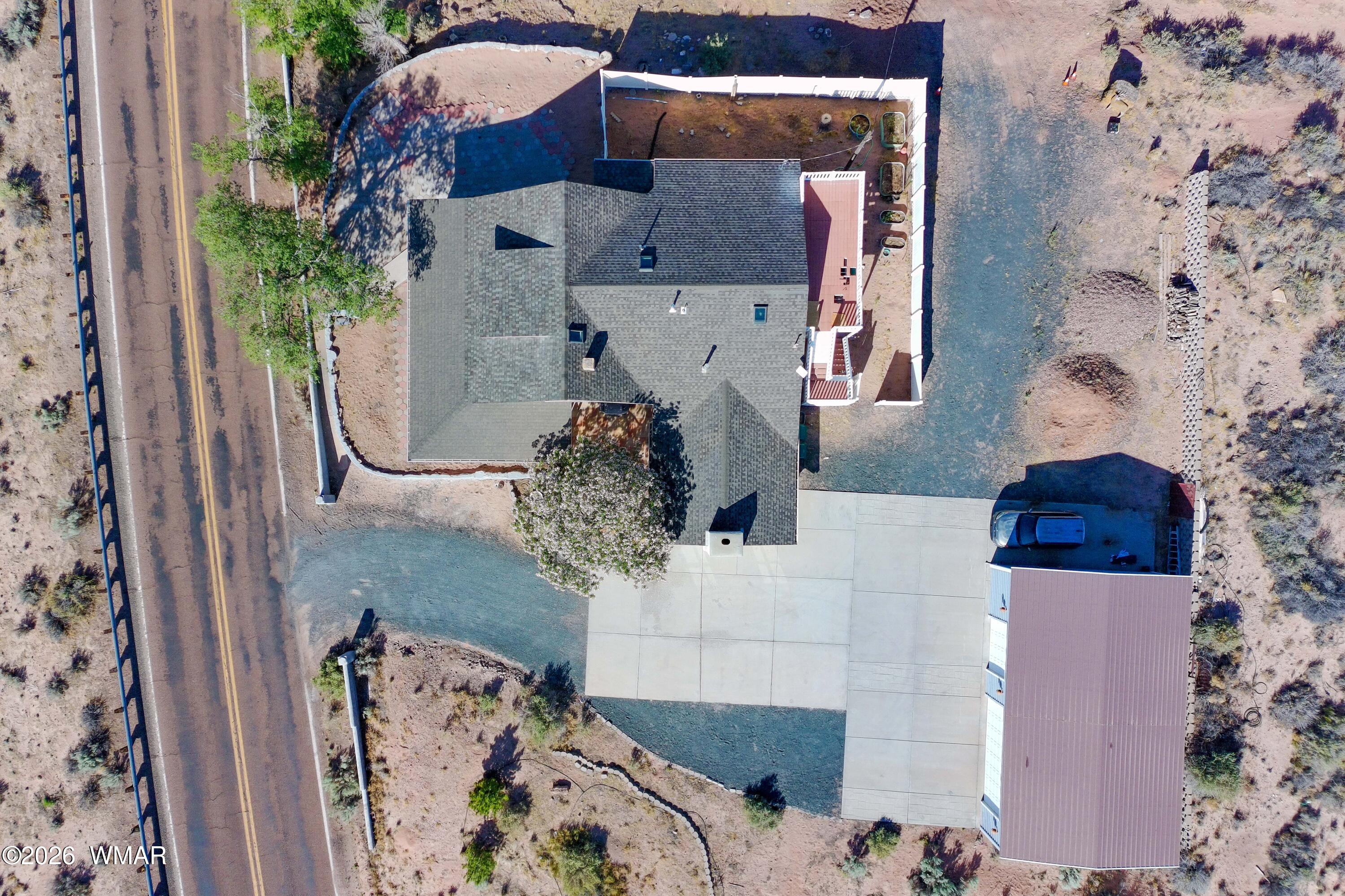 102 Crestview Road Holbrook, AZ 86025 - Photo 54 of 55 an aerial view of a house with outdoor space