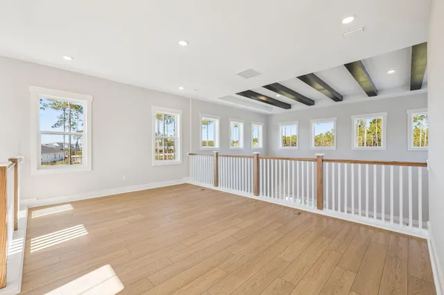 a view of room with window and stairs