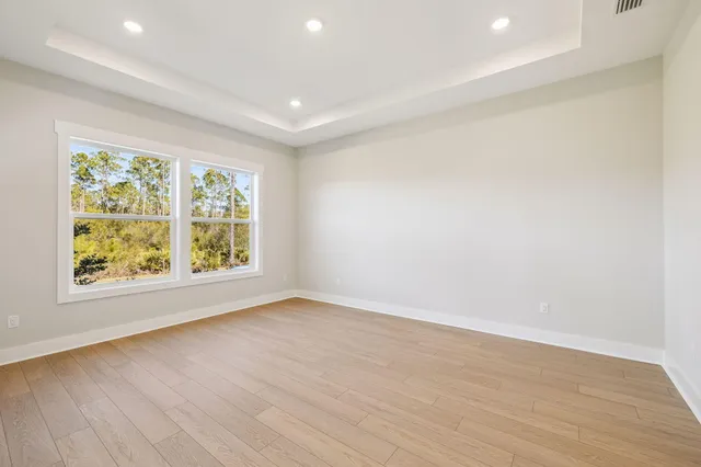 a view of a balcony with chairs