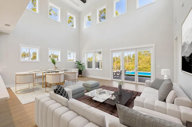 a living room with furniture and windows