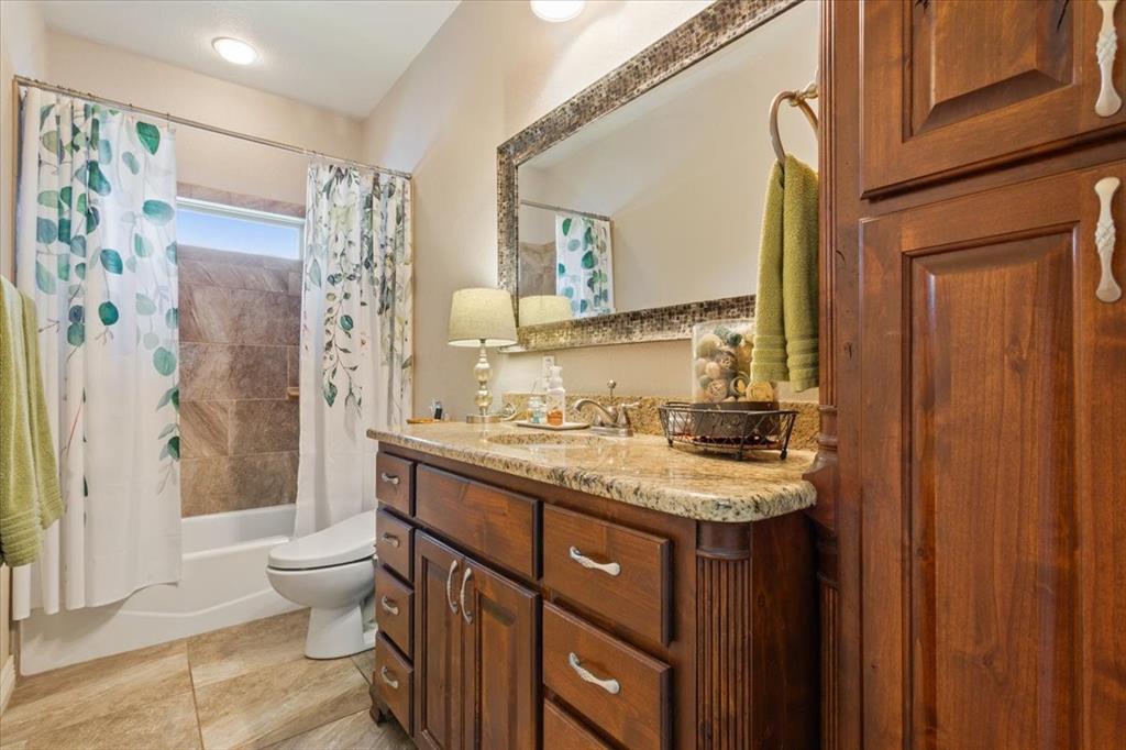 128 Creek Ridge Drive Waco, TX 76708 - Photo 27 of 40 Full bath with shower / bath combo, toilet, and vanity
