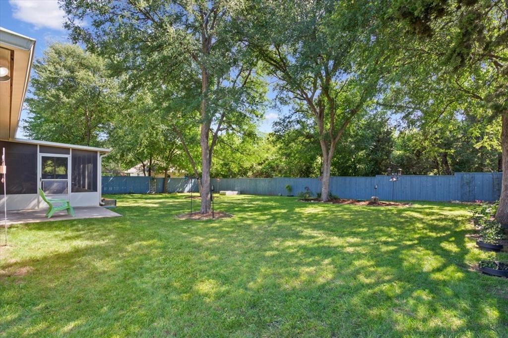 128 Creek Ridge Drive Waco, TX 76708 - Photo 36 of 40 View of yard featuring a sunroom
