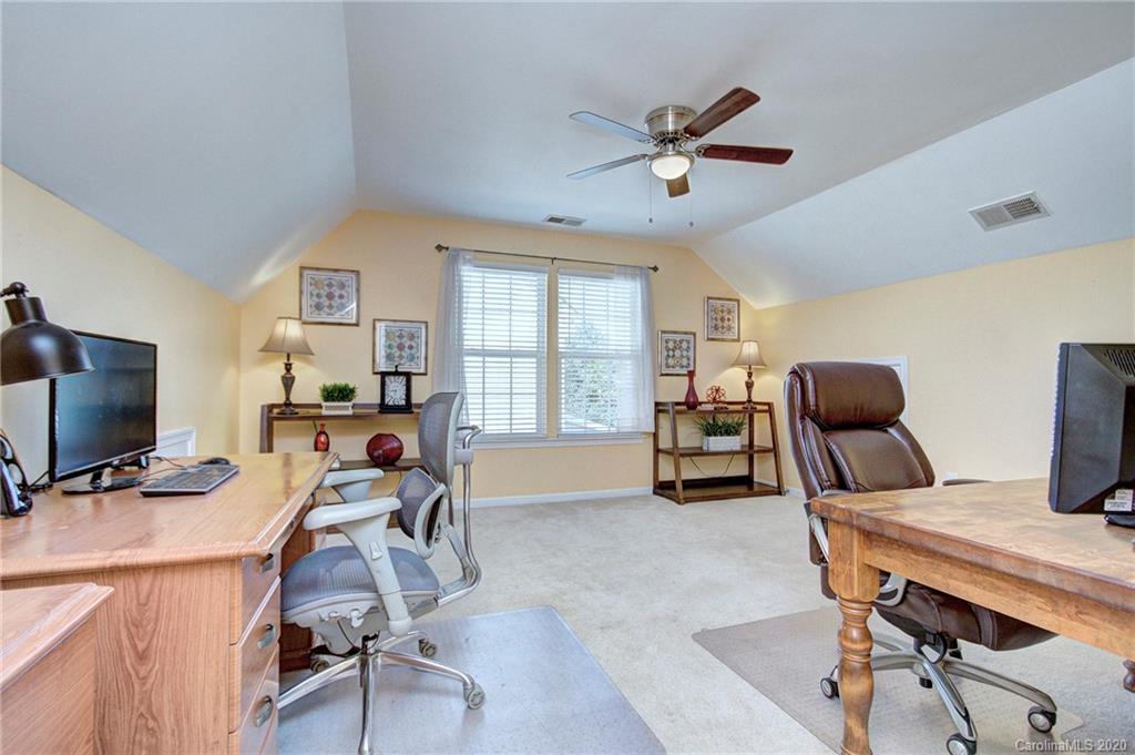 7029 Meyer Road Fort Mill, SC 29715 - Photo 29 of 42 a view of a workspace with furniture and a window