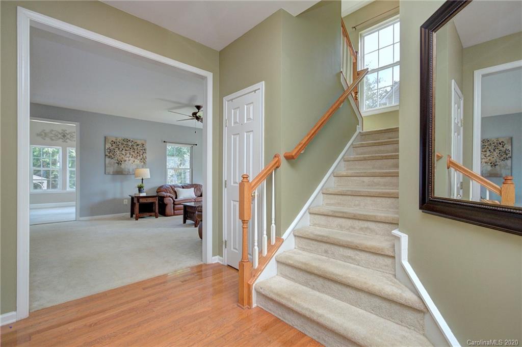 7029 Meyer Road Fort Mill, SC 29715 - Photo 6 of 42 a view of a livingroom with furniture and staircase