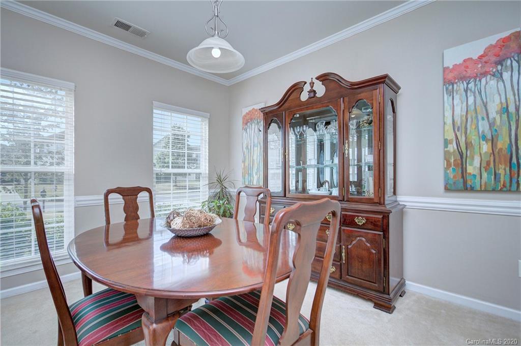 7029 Meyer Road Fort Mill, SC 29715 - Photo 7 of 42 a view of a dining room with furniture window and outside view