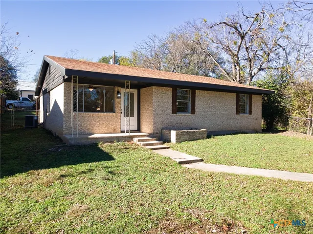a front view of house with yard