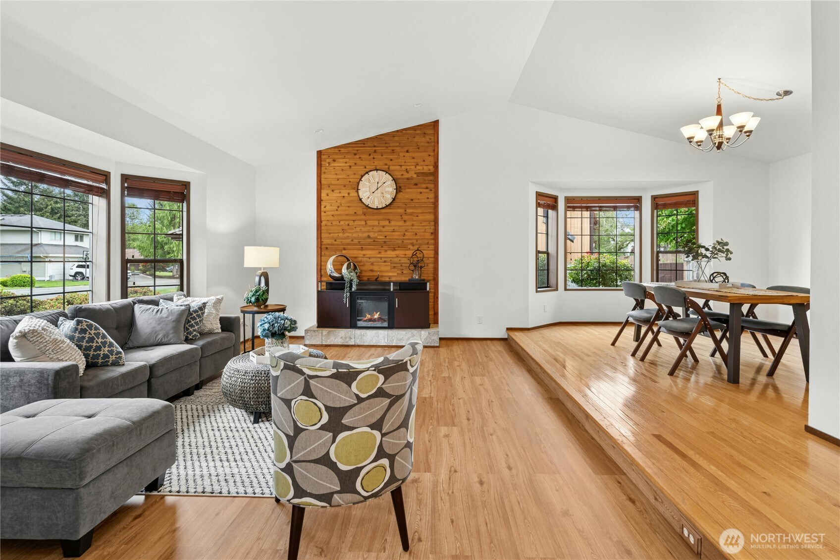 5211 103rd Street Southwest, Unit SW Mukilteo, WA 98275 - Photo 5 of 40 a living room with furniture and a large window