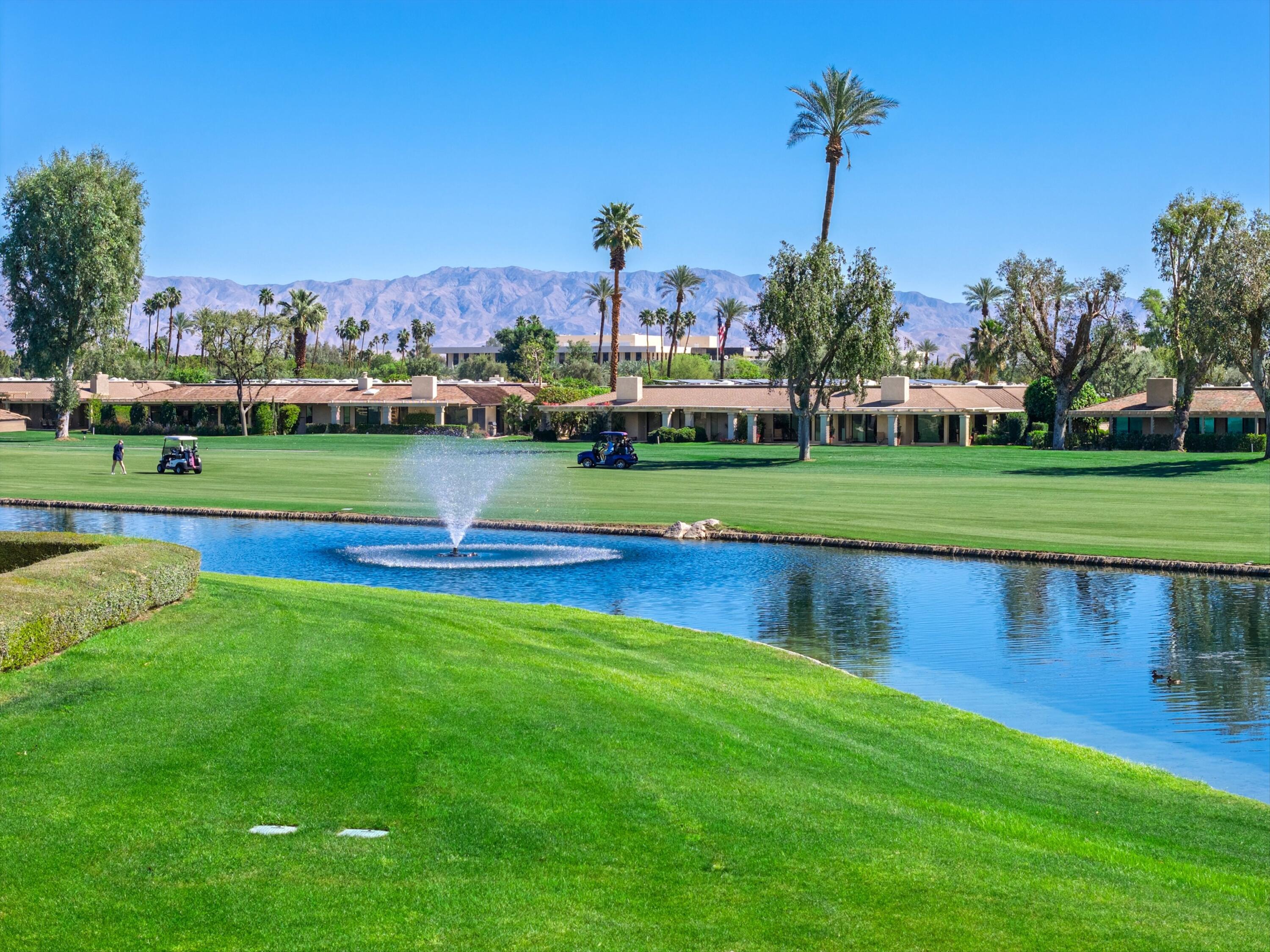3 Barnard Court Rancho Mirage, CA 92270 - Photo 46 of 47 a view of a park and trees in the background