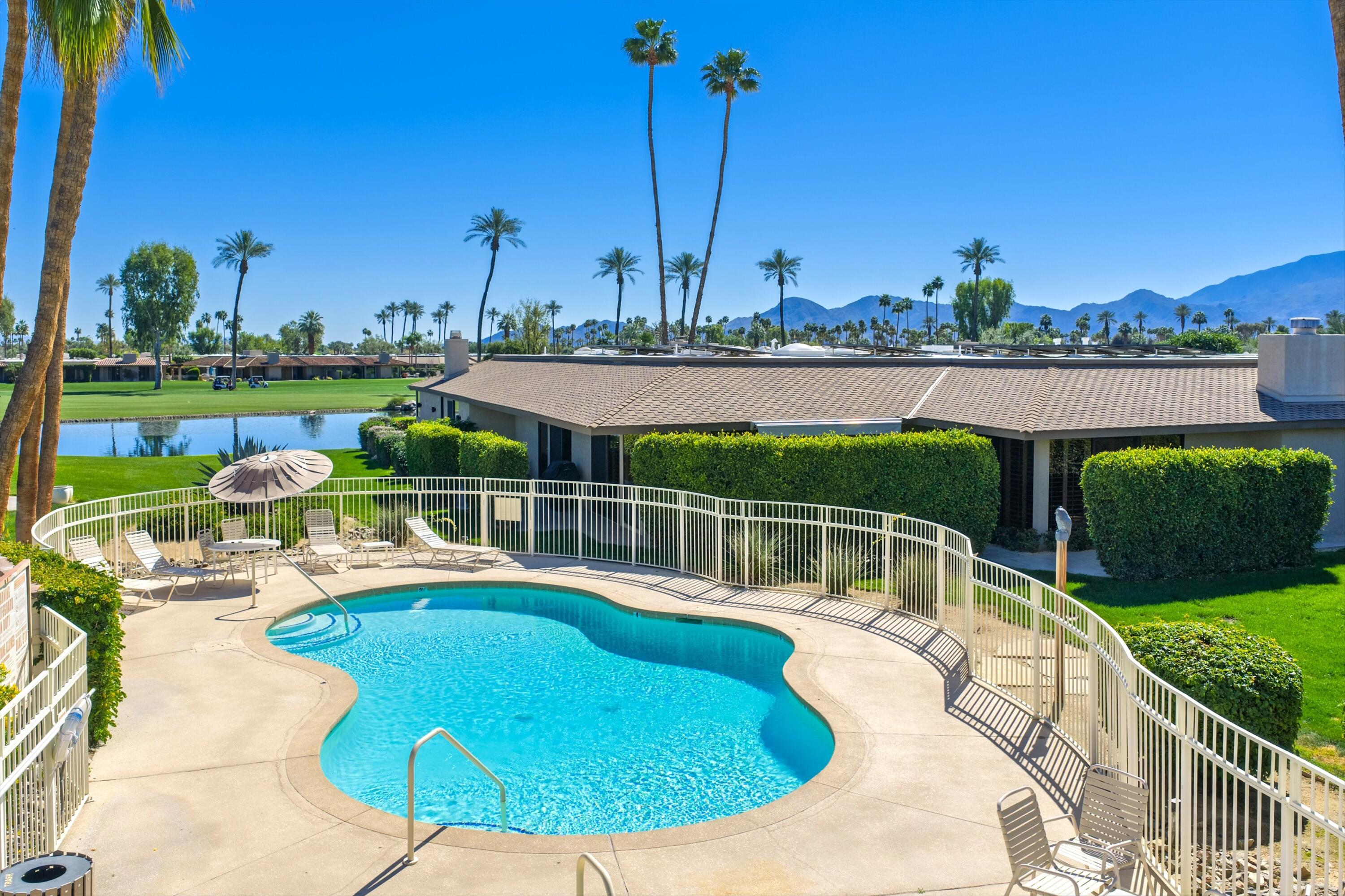 3 Barnard Court Rancho Mirage, CA 92270 - Photo 47 of 47 a view of a swimming pool with a patio