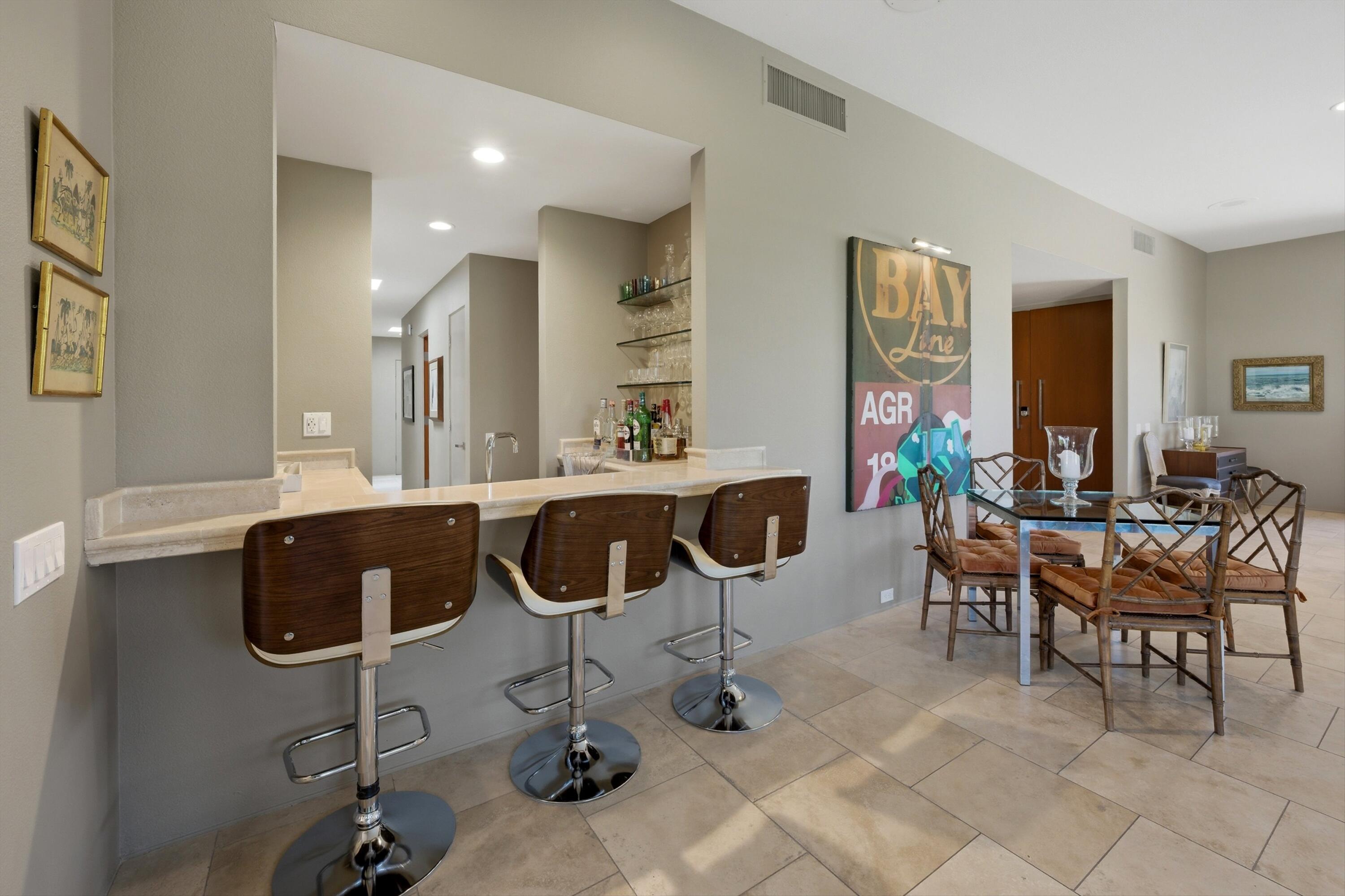3 Barnard Court Rancho Mirage, CA 92270 - Photo 7 of 47 a view of a dining room with furniture