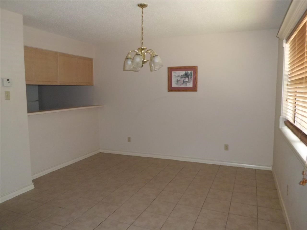 8915 McPherson Road, Unit 31D Laredo, TX 78045 - Photo 4 of 9 a view of a room with a window and ceiling fan