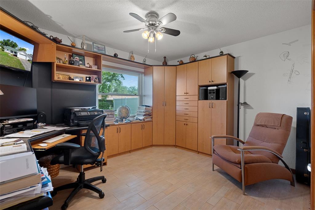 5035 Harbinger Road Spring Hill, FL 34608 - Photo 39 of 47 a work room with furniture and a window
