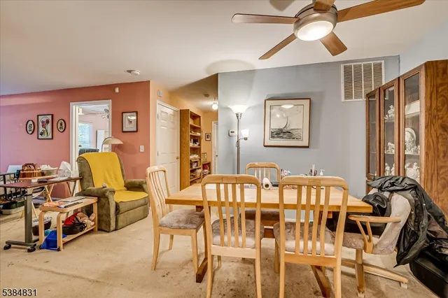 a kitchen with stainless steel appliances granite countertop a stove sink and cabinets