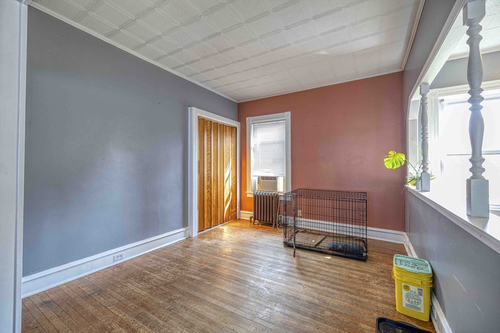 60 Murray Street Fall River, MA 02720 - Photo 11 of 35 a view of a room with furniture and a window