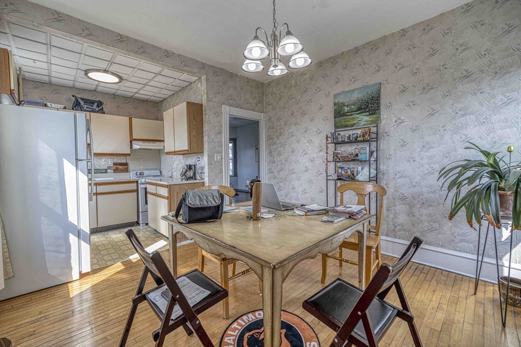 60 Murray Street Fall River, MA 02720 - Photo 12 of 35 a view of a dining room with furniture window and wooden floor