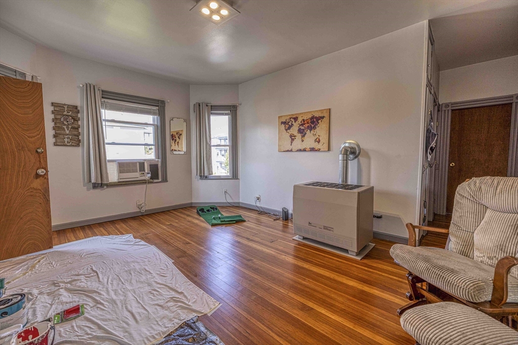 60 Murray Street Fall River, MA 02720 - Photo 15 of 35 a bedroom with furniture and a wooden floor