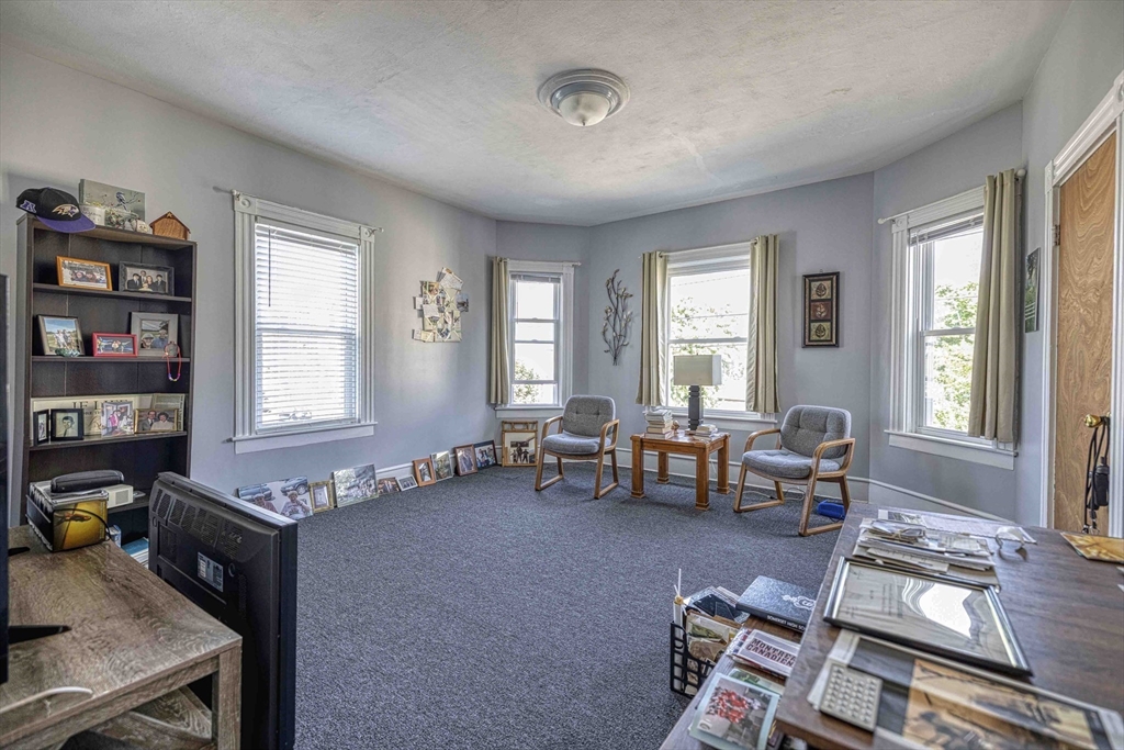 60 Murray Street Fall River, MA 02720 - Photo 17 of 35 a living room with furniture and a window