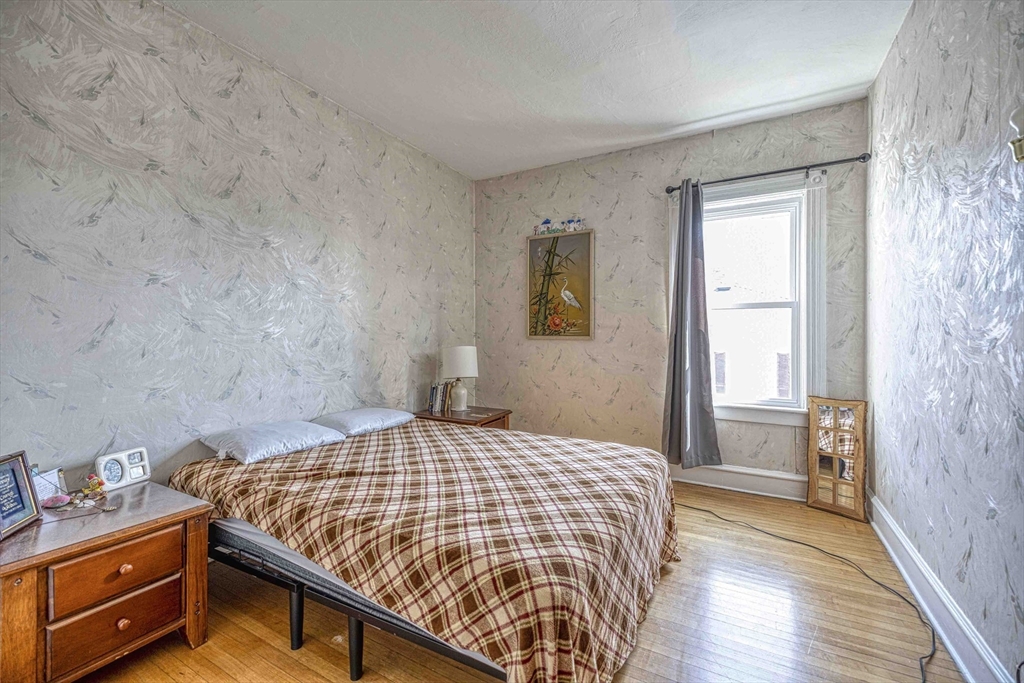 60 Murray Street Fall River, MA 02720 - Photo 18 of 35 a bedroom with a bed and a window