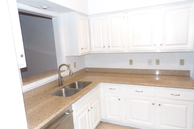 a swimming pool with outdoor seating and yard