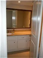 a view of a chandelier fan in a room